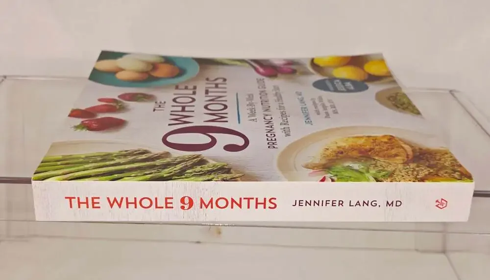 The Whole 9 Months: A Week-By-Week Pregnancy Nutrition Guide by Jennifer Lang, M